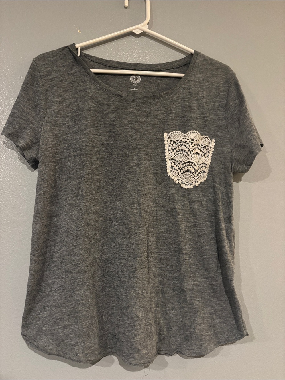 Gray women’s top with lace pocket
